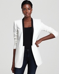 No longer just for formal wear, this BCBGMAXAZRIA tuxedo jacket updates your wardrobe with fashion-forward flair, working color blocking and menswear-inspired style simultaneously. Team with ankle pants or go edgy and choose distressed skinny jeans. No longer just for formal wear, this BCBGMAXAZRIA tuxedo jacket updates your wardrobe with fashion-forward flair, working color blocking and menswear-inspired style simultaneously. Team with ankle pants or go edgy and choose distressed skinny jeans.