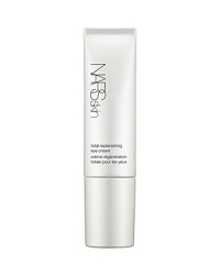 This all-in-one eye gel-cream addresses the major eye area concerns-dryness, dark circles, puffiness and wrinkles-to promote a look of vitality. Enriched with NARS exclusive Light Reflecting Complex™ and potent hydrating ingredients, Total Replenishing Eye Cream plumps delicate skin and leaves the eye area feeling moisturized and replenished. Hyaluronic Acid boosts moisture retention in the skin, slowing water loss and keeping the skin moisturized. A combination of peptides works to fade the appearance of dark undereye circles and reduce puffiness while Beech Bud Extract stimulates skin's natural production of collagen.* The appearance of fine lines and wrinkles is visibly reduced and the eye area takes on a smooth, supple, firm appearance. Illuminating pearls instantly brighten while Yeast Polysaccharides improve micro-circulation*, helping bring life back to the eye area. Skin looks refreshed, bright and luminous. Absorbed instantly, Total Replenishing Eye Cream smooths the way for concealer application and color that looks brilliant and lasts. *in-vitro test For all skin typesOphthalmologist & Dermatologist Tested Non-Comedogenic Synthetic Fragrance Free Paraben Free Alcohol Free This all-in-one eye gel-cream addresses the major eye area concerns-dryness, dark circles, puffiness and wrinkles-to promote a look of vitality. Enriched with NARS exclusive Light Reflecting Complex™ and potent hydrating ingredients, Total Replenishing Eye Cream plumps delicate skin and leaves the eye area feeling moisturized and replenished. Hyaluronic Acid boosts moisture retention in the skin, slowing water loss and keeping the skin moisturized. A combination of peptides works to fade the appearance of dark undereye circles and reduce puffiness while Beech Bud Extract stimulates skin's natural production of collagen.* The appearance of fine lines and wrinkles is visibly reduced and the eye area takes on a smooth, supple, firm appearance. Illuminating pearls instantly brighten while Yeast Polysaccharides improve micro-circulation*, helping bring life back to the eye area. Skin looks refreshed, bright and luminous. Absorbed instantly, Total Replenishing Eye Cream smooths the way for concealer application and color that looks brilliant and lasts. *in-vitro test For all skin typesOphthalmologist & Dermatologist Tested Non-Comedogenic Synthetic Fragrance Free Paraben Free Alcohol Free