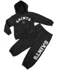 He'll have super-fan status early in this comfortable, sporty New York Giants NFL hoodie and pant set from Outerstuff. He'll have super-fan status early in this comfortable, sporty New York Giants NFL hoodie and pant set from Outerstuff.