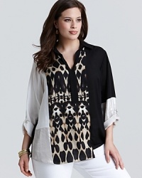 Mixing monochromatic color blocking with a vivid animal print, this Calvin Klein Plus blouse infuses your fashion repertoire with a touch of the wild. Mixing monochromatic color blocking with a vivid animal print, this Calvin Klein Plus blouse infuses your fashion repertoire with a touch of the wild.