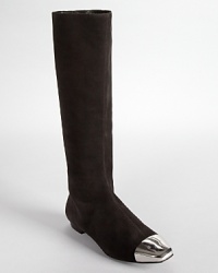 All out mod, Sigerson Morrison's metal-tipped boots channel a 60s look with right-now appeal. All out mod, Sigerson Morrison's metal-tipped boots channel a 60s look with right-now appeal.