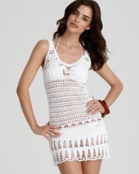 This beautiful crochet sheath dress from Nanette Leporte gives more than a hint of the suit beneath. This beautiful crochet sheath dress from Nanette Leporte gives more than a hint of the suit beneath.