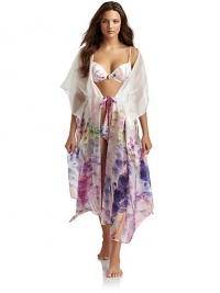 THE LOOKPastel flower print with shimmery pearlescent finishKimono-inspired sleevesDrawstring sash ties at waistTHE FITAbout 51 from shoulder to hemTHE MATERIAL67% silk/33% nylonCARE & ORIGINHand washImported