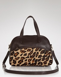 This perennially polished DKNY carryall gets wild in spot-splashed calf hair with luxe leather trim. Elegantly on-trend, let this beauty be the basis of your next fashion moment. This perennially polished DKNY carryall gets wild in spot-splashed calf hair with luxe leather trim. Elegantly on-trend, let this beauty be the basis of your next fashion moment.