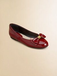 A dress-up favorite for every girl, shiny patent leather design topped with a classic bow and logo-embossed hardware.Patent leather upperCheck printed padded insoleMan-made soleImported A dress-up favorite for every girl, shiny patent leather design topped with a classic bow and logo-embossed hardware.Patent leather upperCheck printed padded insoleMan-made soleImported