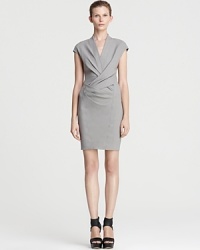Sophisticated, modern and undeniable chic, this Helmut Lang dress is a modern interpretation of the classic sheath and a must-have for the fashion-forward career woman. Punctuate the minimalist silhouette with chunky wedges and head directly to the corner office. Sophisticated, modern and undeniable chic, this Helmut Lang dress is a modern interpretation of the classic sheath and a must-have for the fashion-forward career woman. Punctuate the minimalist silhouette with chunky wedges and head directly to the corner office.