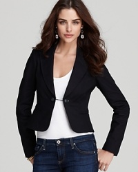 A slim cut and cropped silhouette infuse this Juicy Couture blazer with modern femininity. Slip the style over cocktail dresses for an element of surprise, or dress it down with jeans and a tee for everyday sophistication. A slim cut and cropped silhouette infuse this Juicy Couture blazer with modern femininity. Slip the style over cocktail dresses for an element of surprise, or dress it down with jeans and a tee for everyday sophistication.
