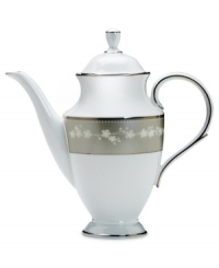 Your guests will linger over the beauty of this bone china coffee pot finely decorated with a delicate floral design with textured white beads and elegant platinum trim. From Lenox's dinnerware and dishes collection. Your guests will linger over the beauty of this bone china coffee pot finely decorated with a delicate floral design with textured white beads and elegant platinum trim. From Lenox's dinnerware and dishes collection.