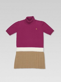 Rendered in ultra-fine wool in a drop-waist silhouette with pleated skirt and interlocking G accent.TurtleneckShort sleevesPullover styleDrop waistPleated skirtWoolDry cleanMade in Italy Rendered in ultra-fine wool in a drop-waist silhouette with pleated skirt and interlocking G accent.TurtleneckShort sleevesPullover styleDrop waistPleated skirtWoolDry cleanMade in Italy