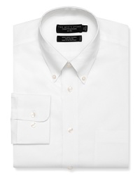 Long sleeve dress shirt with point, button down collar. Single needle tailoring, angle cut barrel cuffs with two buttons to resize width. Chest pocket. Textured solid white. Long sleeve dress shirt with point, button down collar. Single needle tailoring, angle cut barrel cuffs with two buttons to resize width. Chest pocket. Textured solid white.