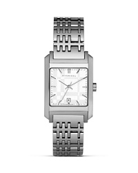 This sleek watch from Burberry features a stainless steel square case with a subtle sun ray textured face, and a check-inspired link bracelet. This sleek watch from Burberry features a stainless steel square case with a subtle sun ray textured face, and a check-inspired link bracelet.