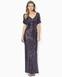 In sparkling allover sequins, Lauren Ralph Lauren's brilliant gown lends an opulent look for evening. In sparkling allover sequins, Lauren Ralph Lauren's brilliant gown lends an opulent look for evening.