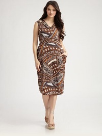 Right on trend this season, this tribal-print, stretch silk design features a feminine cowlneck and a curve-flattering silhouette. CowlneckSleevelessSlash pocketsFront and back seamsAbout 30 from natural waist95% silk/5% elastaneDry cleanImported Right on trend this season, this tribal-print, stretch silk design features a feminine cowlneck and a curve-flattering silhouette. CowlneckSleevelessSlash pocketsFront and back seamsAbout 30 from natural waist95% silk/5% elastaneDry cleanImported