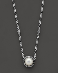 From the Luna Collection, an elegant pearl pendant with silver accents hangs from this chunky 2-station link necklace.Designed by Lagos. From the Luna Collection, an elegant pearl pendant with silver accents hangs from this chunky 2-station link necklace.Designed by Lagos.