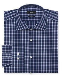 A traditionally patterned button-down with modern updates, rendered in the softest, crispest cotton for a brilliant finish, tailored with a contemporary fit. A traditionally patterned button-down with modern updates, rendered in the softest, crispest cotton for a brilliant finish, tailored with a contemporary fit.