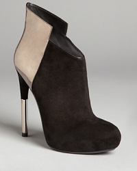 The sky's the limit and the future is now with these stylish Sigerson Morrison platform booties. Metallic accents at the back and heel set this pair in its own special class. The sky's the limit and the future is now with these stylish Sigerson Morrison platform booties. Metallic accents at the back and heel set this pair in its own special class.