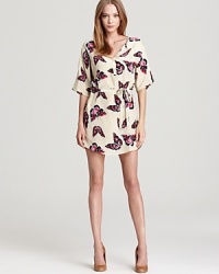 Looking for a whimsical addition to your capsule collection? This butterfly-print Tucker tunic answers the call. Designed with white buttons at the neckline and side vents at the hem, it's polished and playful at the same time. Looking for a whimsical addition to your capsule collection? This butterfly-print Tucker tunic answers the call. Designed with white buttons at the neckline and side vents at the hem, it's polished and playful at the same time.