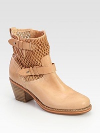 Perforated leather moto design with adjustable wrap-around buckles and a chunky stacked heel. Stacked heel, 2½ (65mm)Leather upperPull-on styleLeather lining and soleRubber solePadded insoleImportedOUR FIT MODEL RECOMMENDS ordering true size. Perforated leather moto design with adjustable wrap-around buckles and a chunky stacked heel. Stacked heel, 2½ (65mm)Leather upperPull-on styleLeather lining and soleRubber solePadded insoleImportedOUR FIT MODEL RECOMMENDS ordering true size.
