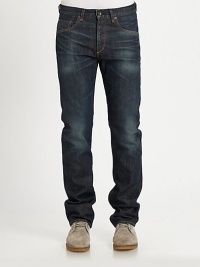 Slim-straight fit in an indigo-washed finish, detailed with a five-pocket set and subtle whiskering and fading throughout the leg, for a signature statement look.Five-pocket seamInseam, about 32CottonDry cleanMade in USA Slim-straight fit in an indigo-washed finish, detailed with a five-pocket set and subtle whiskering and fading throughout the leg, for a signature statement look.Five-pocket seamInseam, about 32CottonDry cleanMade in USA