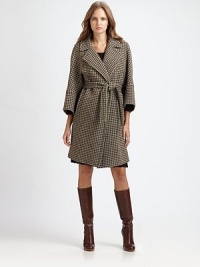 Featuring classic tweed, a belted coat with cocoon-inspired sleeves.Notched collarThree-quarter sleevesSelf-tie beltSlash pocketsFully linedAbout 36 from shoulder to hemVirgin woolDry cleanImported Model shown is 5'11 (180cm) wearing US size 4.This style runs large. We recommend ordering one size down for a standard fit. Featuring classic tweed, a belted coat with cocoon-inspired sleeves.Notched collarThree-quarter sleevesSelf-tie beltSlash pocketsFully linedAbout 36 from shoulder to hemVirgin woolDry cleanImported Model shown is 5'11 (180cm) wearing US size 4.This style runs large. We recommend ordering one size down for a standard fit.