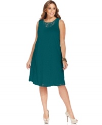 Get set for the holiday party circuit with Cha Cha Vente's sleeveless plus size dress, fashioned from alluring lace.