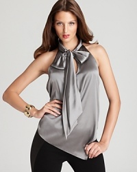 In soft, stretch silk, Elie Tahari's Dinah blouse lends a crisp look--a tie at the neck exudes femininity. In soft, stretch silk, Elie Tahari's Dinah blouse lends a crisp look--a tie at the neck exudes femininity.