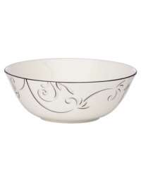 A fluid contemporary pattern with subtle shimmer dances along the edging of this serving bowl. As a stylish accent for entertaining or a simple way to spruce up an everyday meal, the Voila collection always looks right. A fluid contemporary pattern with subtle shimmer dances along the edging of this serving bowl. As a stylish accent for entertaining or a simple way to spruce up an everyday meal, the Voila collection always looks right.