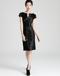 Step up the chic with this winter-perfect Escada pony and goat hair dress, boasting luxe texture and glossy shine. Step up the chic with this winter-perfect Escada pony and goat hair dress, boasting luxe texture and glossy shine.