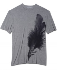 This feather graphic t-shirt from Calvin Klein definitely flies with your casual style. This feather graphic t-shirt from Calvin Klein definitely flies with your casual style.
