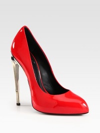 A high-reaching metal heel is at the center of this patent leather point toe design. Metal heel, 5 (125mm)Patent leather upperPoint toeLeather liningLeather sole with a rubber insertPadded insoleMade in Italy A high-reaching metal heel is at the center of this patent leather point toe design. Metal heel, 5 (125mm)Patent leather upperPoint toeLeather liningLeather sole with a rubber insertPadded insoleMade in Italy