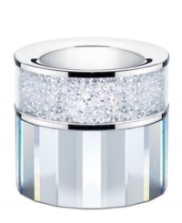 With 1,600 chatons, a multi-faceted base and gleaming silvertone metal, this precious Swarovski Crystalline candle holder transforms a single flame into a truly spectacular light show. With 1,600 chatons, a multi-faceted base and gleaming silvertone metal, this precious Swarovski Crystalline candle holder transforms a single flame into a truly spectacular light show.