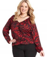 A cinched waist lends a slim silhouette to MICHAEL Michael Kors' printed plus size top-- pair it with your favorite neutral bottoms. A cinched waist lends a slim silhouette to MICHAEL Michael Kors' printed plus size top-- pair it with your favorite neutral bottoms.