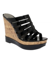 Bold style and beach inspiration combine on the Carleen wedges from G by GUESS. A cork-like heel is the perfect contrast to the high-shine patent finish of these strappy sandals. Bold style and beach inspiration combine on the Carleen wedges from G by GUESS. A cork-like heel is the perfect contrast to the high-shine patent finish of these strappy sandals.