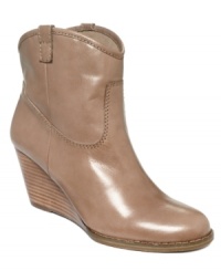 Bandolino's Master wedge booties strike a great balance between the west and the refined. Bandolino's Master wedge booties strike a great balance between the west and the refined.