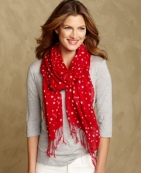 Tommy Hilfiger stamps his classic American style on a soft cotton scarf, complete with a festive star print that feels just right for the season. Tommy Hilfiger stamps his classic American style on a soft cotton scarf, complete with a festive star print that feels just right for the season.