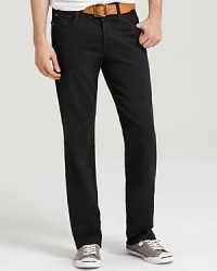 The Standard in Blackout is a classic straight leg fit with a straight waistband and a button fly. It is slim and parallel from the knee to the bottom opening and sits low on the waist. 9 oz stretch denim fabrication. A black warp and weft create a solid, rich black color. Whiskers and wrinkling at the knee and behind the knee create a worn-in appeal, while all black hardware and rivets keep this look polished and clean. The back pocket features 7 For All Mankind's squiggle back pocket design. Button fly. The Standard in Blackout is a classic straight leg fit with a straight waistband and a button fly. It is slim and parallel from the knee to the bottom opening and sits low on the waist. 9 oz stretch denim fabrication. A black warp and weft create a solid, rich black color. Whiskers and wrinkling at the knee and behind the knee create a worn-in appeal, while all black hardware and rivets keep this look polished and clean. The back pocket features 7 For All Mankind's squiggle back pocket design. Button fly.
