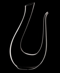 Created to celebrate the 1756 birthday of both Wolfgang Amadeus Mozart and Riedel fine Austrian crystal, the Amadeo Decanter is pure drama for the table. A graceful swoop that resists dripping when poured from, the mouth-blown shape is styled after Mozart's handwritten G note. Holds 52.8 oz. Created to celebrate the 1756 birthday of both Wolfgang Amadeus Mozart and Riedel fine Austrian crystal, the Amadeo Decanter is pure drama for the table. A graceful swoop that resists dripping when poured from, the mouth-blown shape is styled after Mozart's handwritten G note. Holds 52.8 oz.