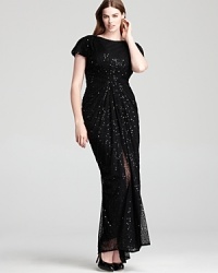 Tadashi Shoji's glamorous, sequin encrusted gown gets seductive with a high front slit in sheer mesh. Tadashi Shoji's glamorous, sequin encrusted gown gets seductive with a high front slit in sheer mesh.