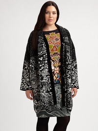Featuring a pretty floral print in timeless black and white, this cocoon coat is guaranteed to be the piece that completes virtually any of your outfits. Snap closureLong sleevesAbout 37 from shoulder to hem60% wool/32% viscose/8% polyamideDry cleanMade in Italy Featuring a pretty floral print in timeless black and white, this cocoon coat is guaranteed to be the piece that completes virtually any of your outfits. Snap closureLong sleevesAbout 37 from shoulder to hem60% wool/32% viscose/8% polyamideDry cleanMade in Italy