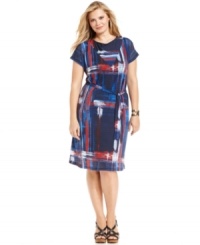 A graphic print highlights J Jones New York short sleeve plus size dress for a modern look-- it's perfect for work! A graphic print highlights J Jones New York short sleeve plus size dress for a modern look-- it's perfect for work!