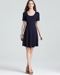 Destined to be a future classic, this Shoshanna dress boasts an intricate cutout pattern at the hem for added interest. Destined to be a future classic, this Shoshanna dress boasts an intricate cutout pattern at the hem for added interest.