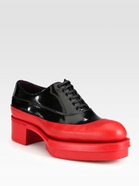 Rubber-dipped lace-up with platform exaggerated sole. Stacked rubber heel, 1¾ (45mm)Rubber platform, 1¼ (30mm)Compares to a ½ heel (15mm)Patent leather and leather upperLeather liningRubber and leather solePadded insoleMade in Italy Rubber-dipped lace-up with platform exaggerated sole. Stacked rubber heel, 1¾ (45mm)Rubber platform, 1¼ (30mm)Compares to a ½ heel (15mm)Patent leather and leather upperLeather liningRubber and leather solePadded insoleMade in Italy
