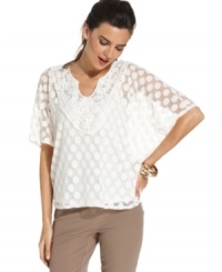 A sheer delight: Alfani's three-quarter sleeve petite top, featuring a whimsical polka-dot pattern and crochet trim. A sheer delight: Alfani's three-quarter sleeve petite top, featuring a whimsical polka-dot pattern and crochet trim.
