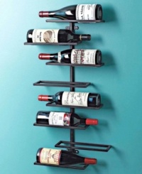 For the burgeoning or expert connoisseur, the Wine Enthusiast collection is perfect for honing your passion. A chic way to both store and display your favorite vintages, this wall wine rack holds 8 bottles and features a smooth black matte finish.