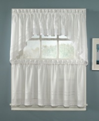 Sweet & simple. An intricate crochet band and double-hem stitch along the bottom accents each delicate café curtain with classic charm and a hand-crafted look. Rod-pocket design for easy hanging. Sweet & simple. An intricate crochet band and double-hem stitch along the bottom accents each delicate café curtain with classic charm and a hand-crafted look. Rod-pocket design for easy hanging.