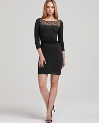 In a fitted silhouette with feminine details, ERIN Erin Fetherston's lace-detailed dress shows off a cinched waist. In a fitted silhouette with feminine details, ERIN Erin Fetherston's lace-detailed dress shows off a cinched waist.