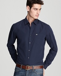 Day and night, this solid cotton poplin button-down shirt keeps you looking crisp and ready to roll. Day and night, this solid cotton poplin button-down shirt keeps you looking crisp and ready to roll.