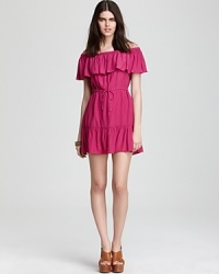 Ruffled accents imbue this richly pigmented DV Dolce Vita dress with feminine charm. Ruffled accents imbue this richly pigmented DV Dolce Vita dress with feminine charm.