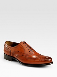 Washed leather lace-up expertly crafted in Italy with fine stitching and brogue detailing.Leather upperLeather liningPadded insoleLeather soleMade in Italy Washed leather lace-up expertly crafted in Italy with fine stitching and brogue detailing.Leather upperLeather liningPadded insoleLeather soleMade in Italy