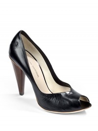THE LOOKPeep toeV-shaped openingWooden cone heel 4 (100mm)THE MATERIALLeather upperLeather lining and soleORIGINMade in Italy THE LOOKPeep toeV-shaped openingWooden cone heel 4 (100mm)THE MATERIALLeather upperLeather lining and soleORIGINMade in Italy